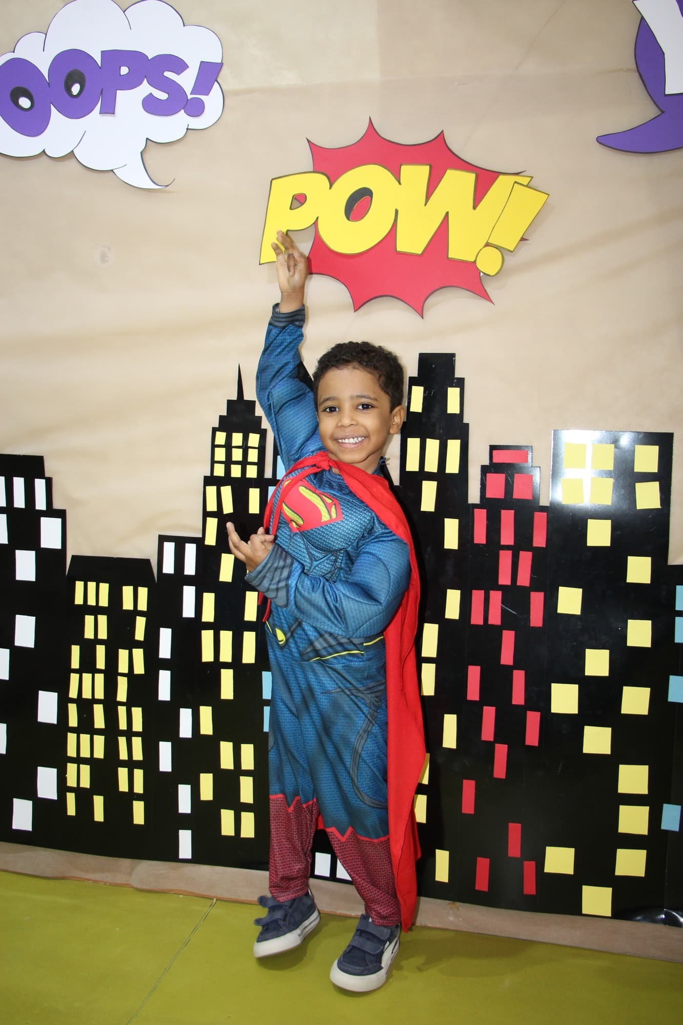 Super Kidz children in costume, celebrating together