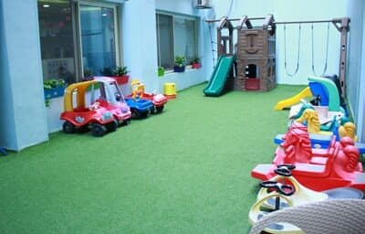 The outdoor playground with climbing and play equipment